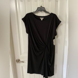 Black dress size large in black knit asymmetrical with drape in front